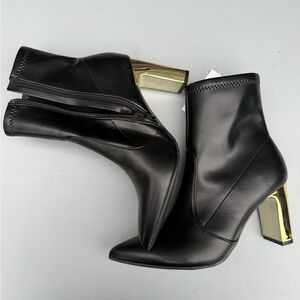 Elegant Black Heeled Boots with Gold Detail